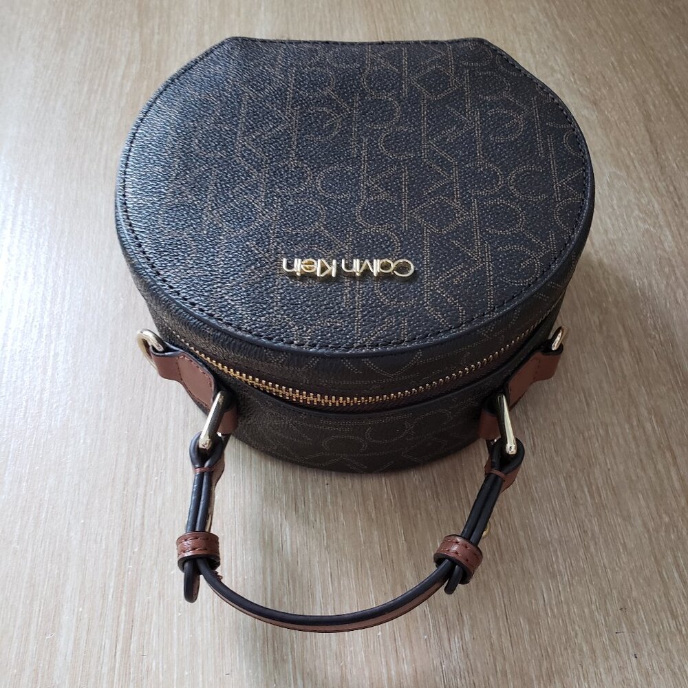 Calvin Klein Dark Brown Monogram Round Crossbody with Tan Handle - Picture 5 of 9